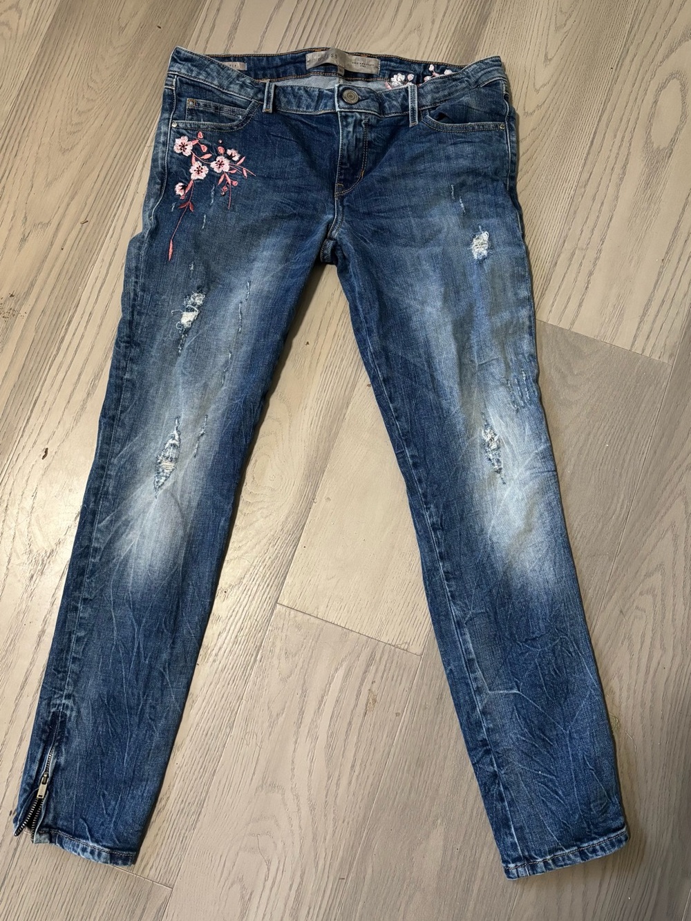Guess Indigo Skinny Jeans with Pink Floral Accent